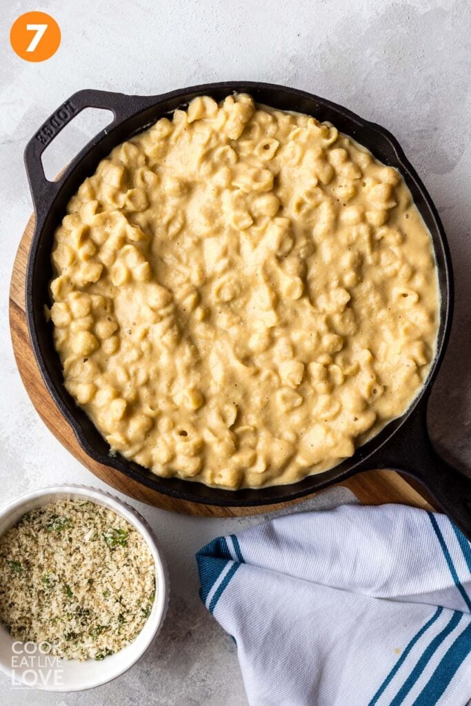 Vegan mac and cheese transferred to a skillet.