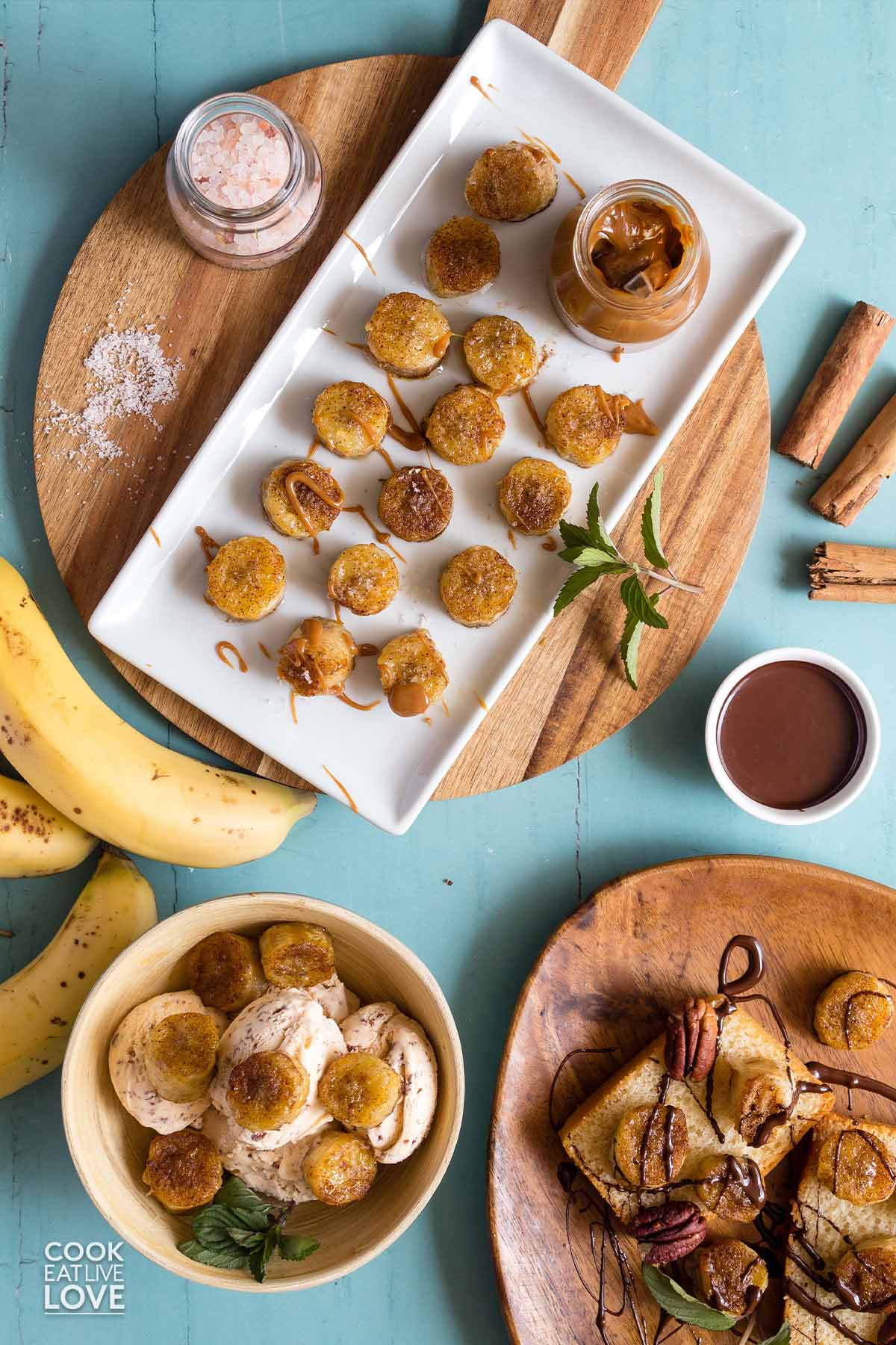 Air fryer bananas on a platter, served on ice cream and on cake.