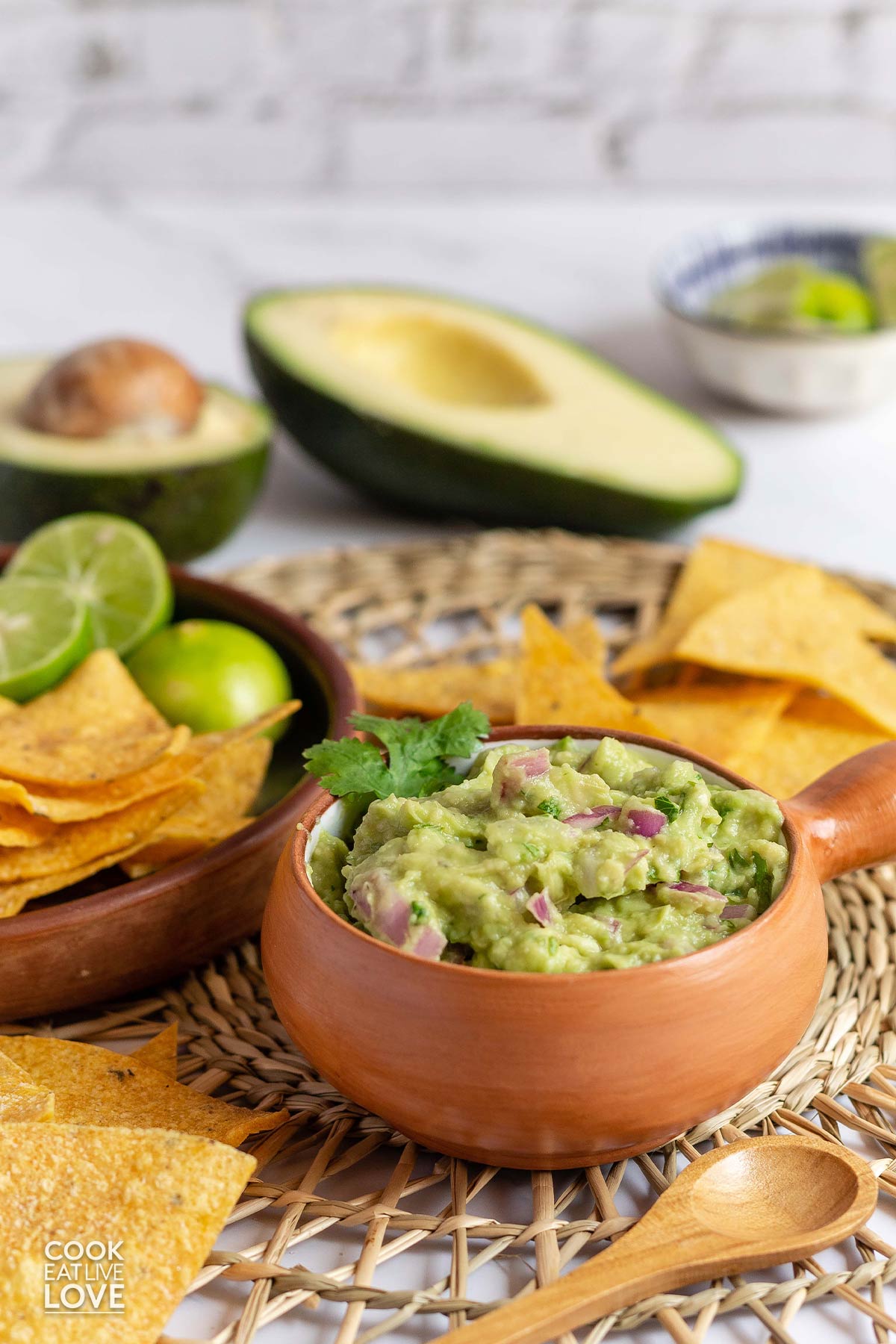 4-ingredient guacamole on the table with tortilla chips.