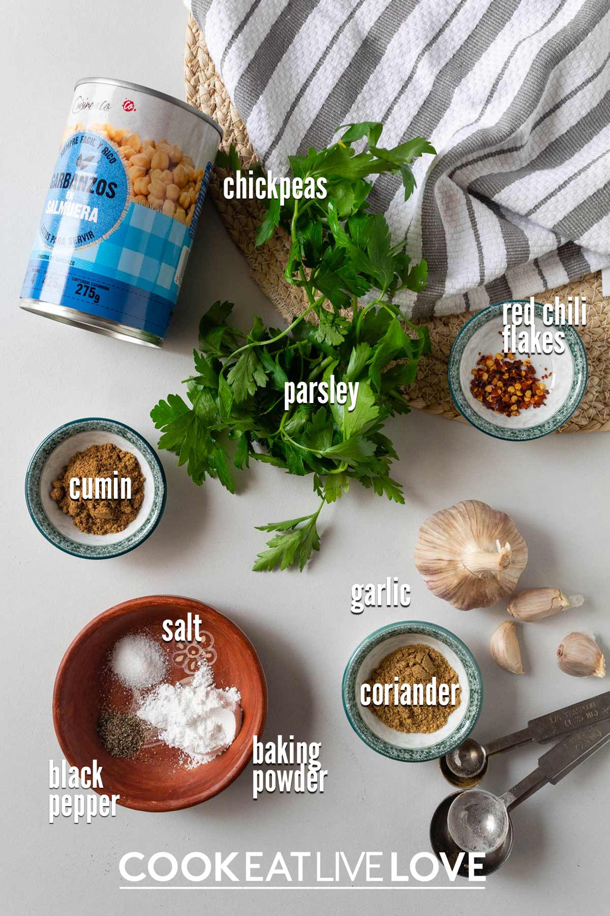 Ingredients to make air fryer falafel on the table with text labels.