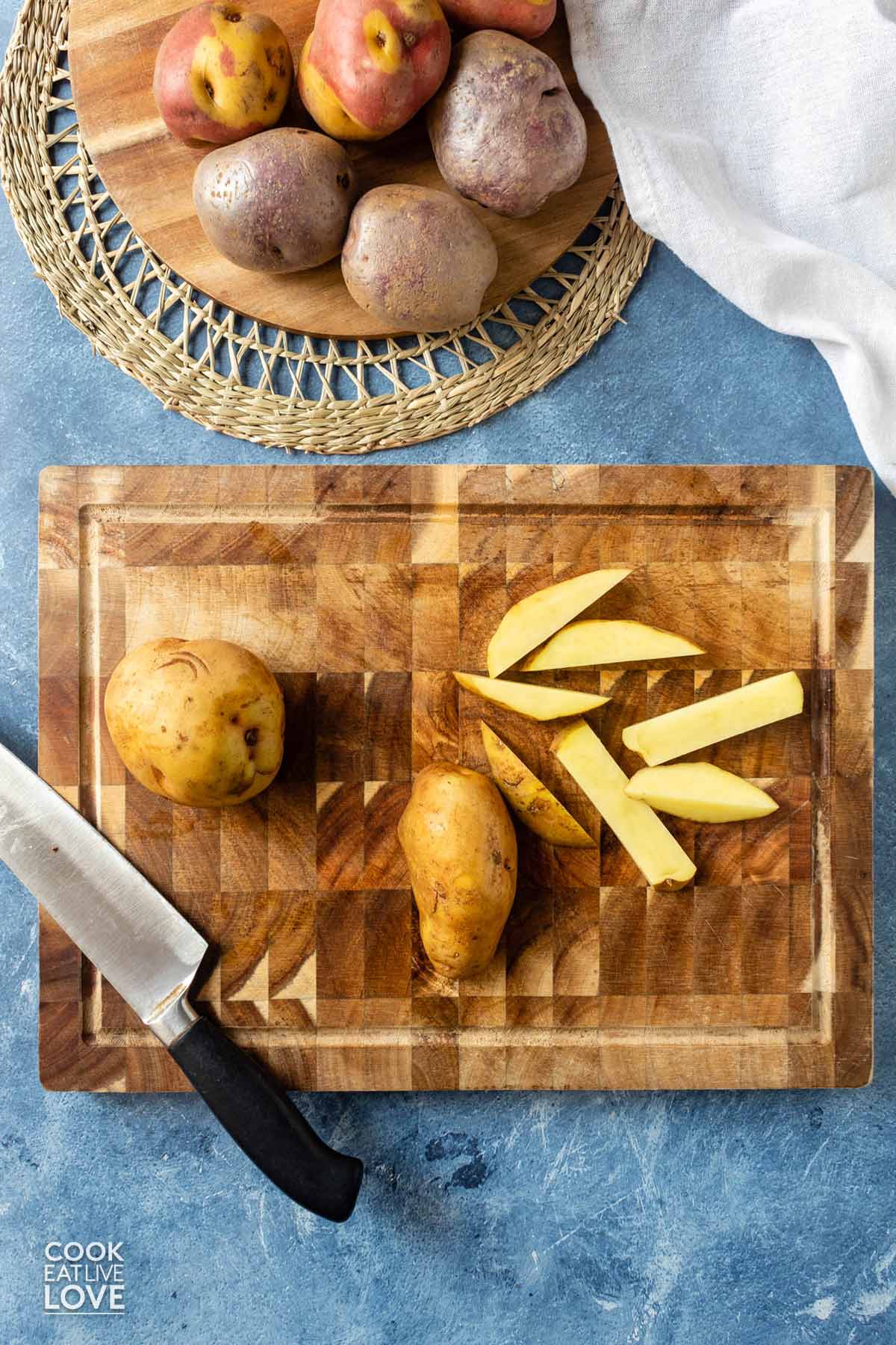Potatoes cut into thick cut fries.