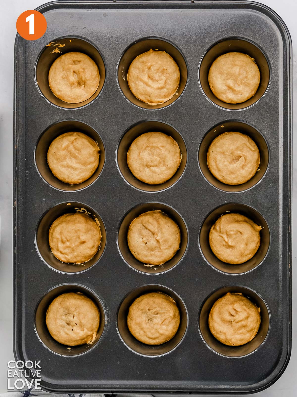 Base of jaffa cakes cooked in a muffin tin.