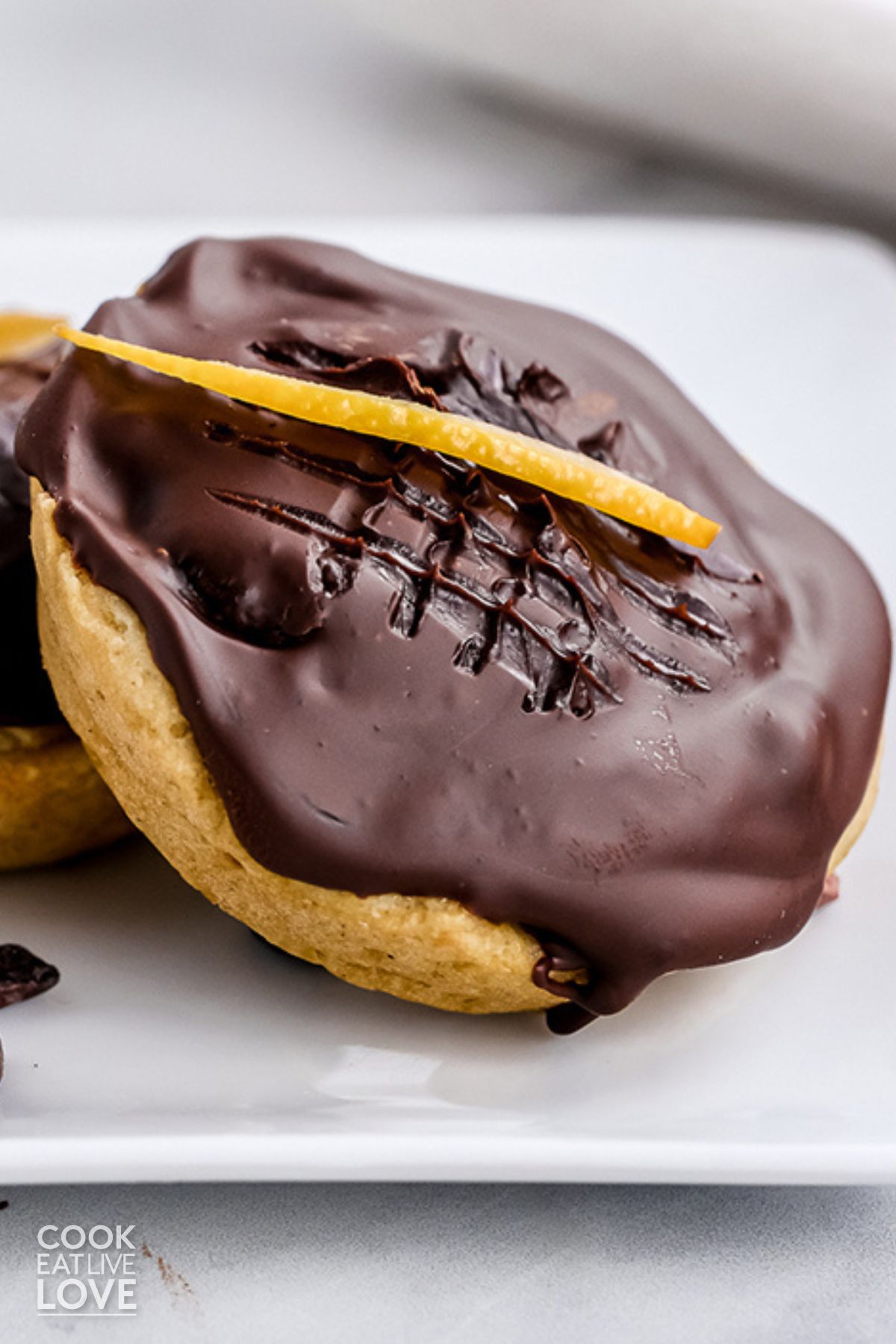 Vegan jaffa cakes on a white plate. 