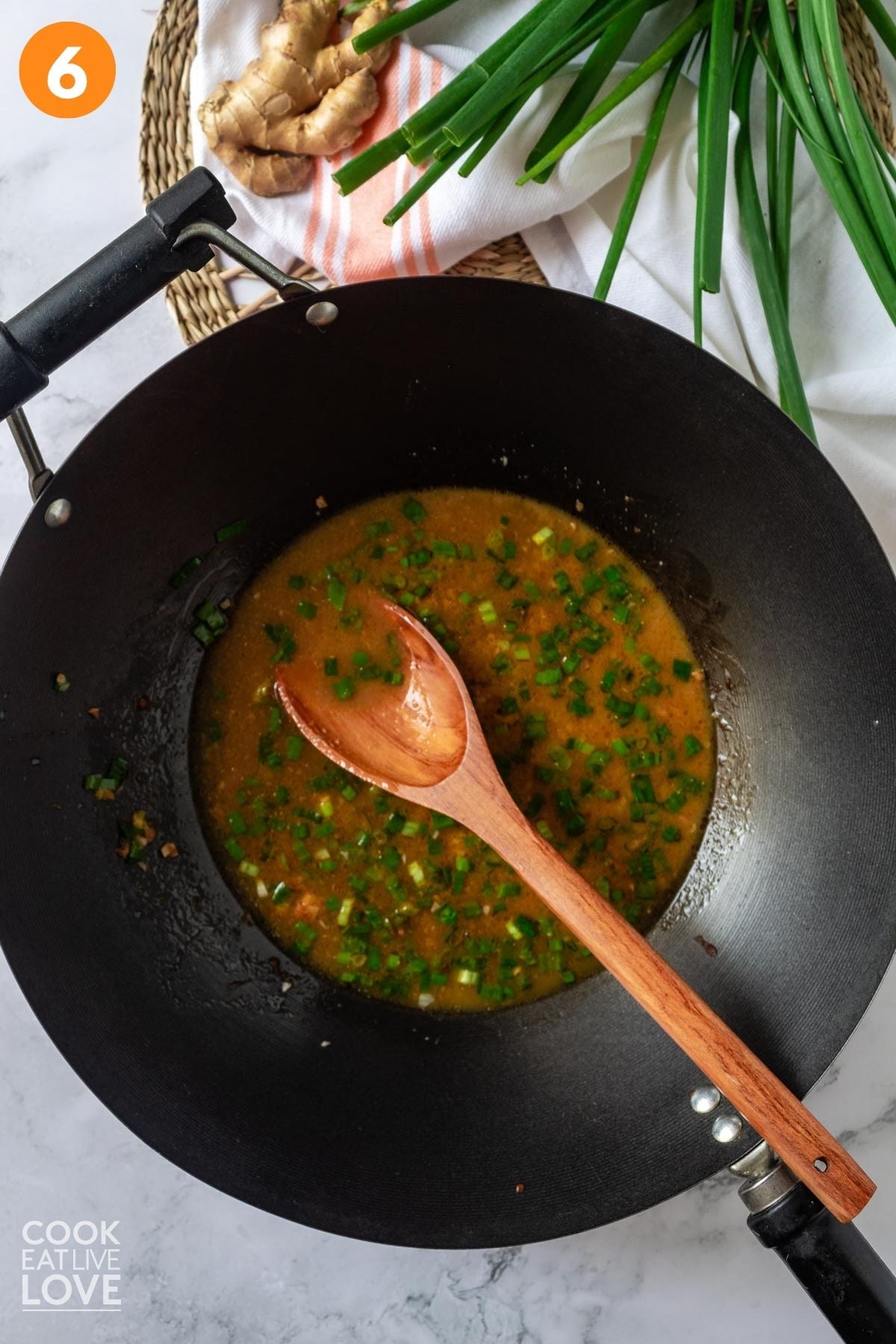 Sauce added to the wok to make orange tofu.