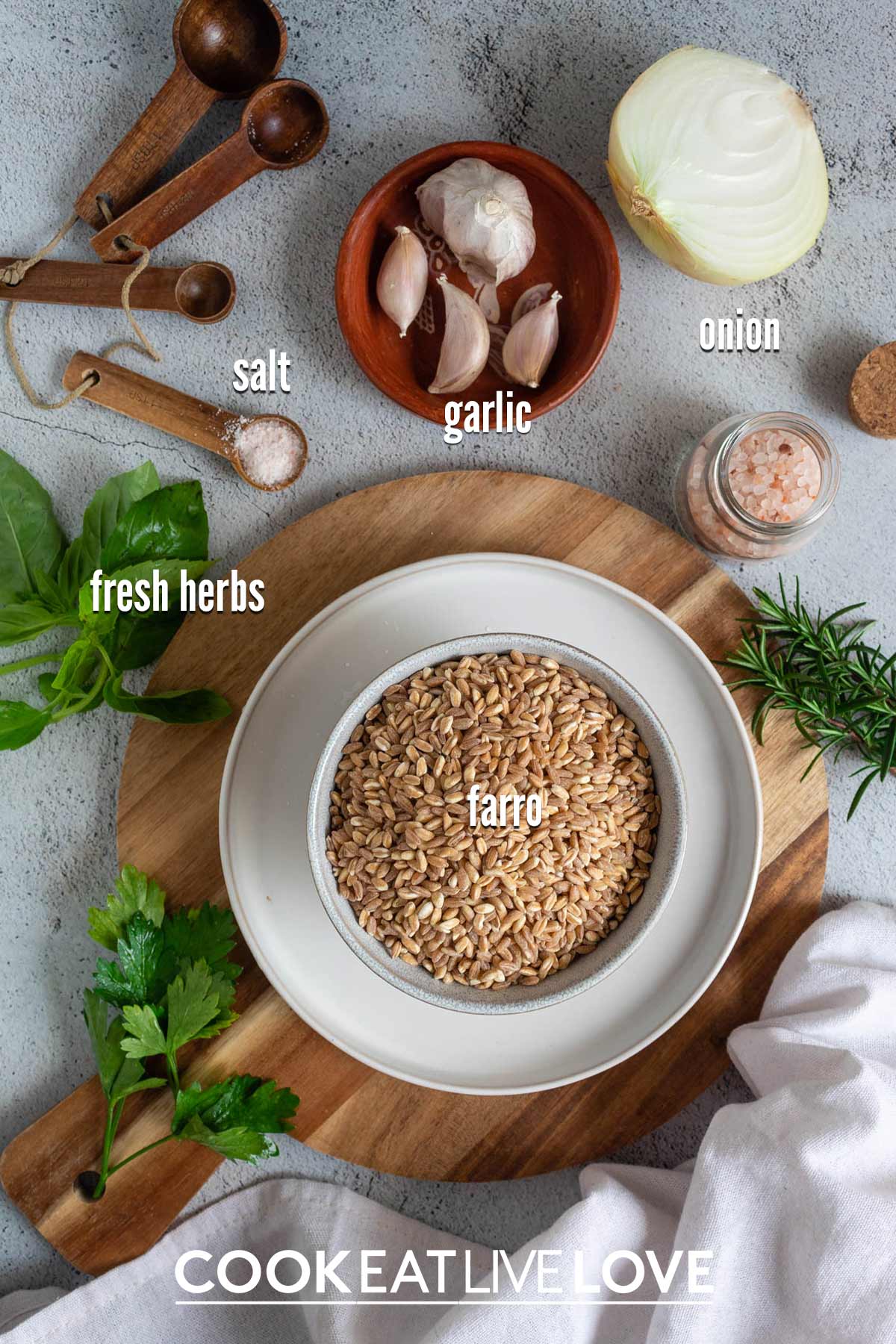 Ingredients to make instant pot farro on the table with text labels.