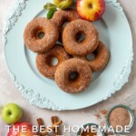 Pin for pinterest graphic with image of platter of vegan apple cider donuts with text on top.