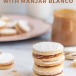 Pin for pinterest graphic with image of stack of alfajores with text on top.