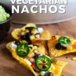 Pin for pinterest graphic with image of vegetarian nachos with text on top.