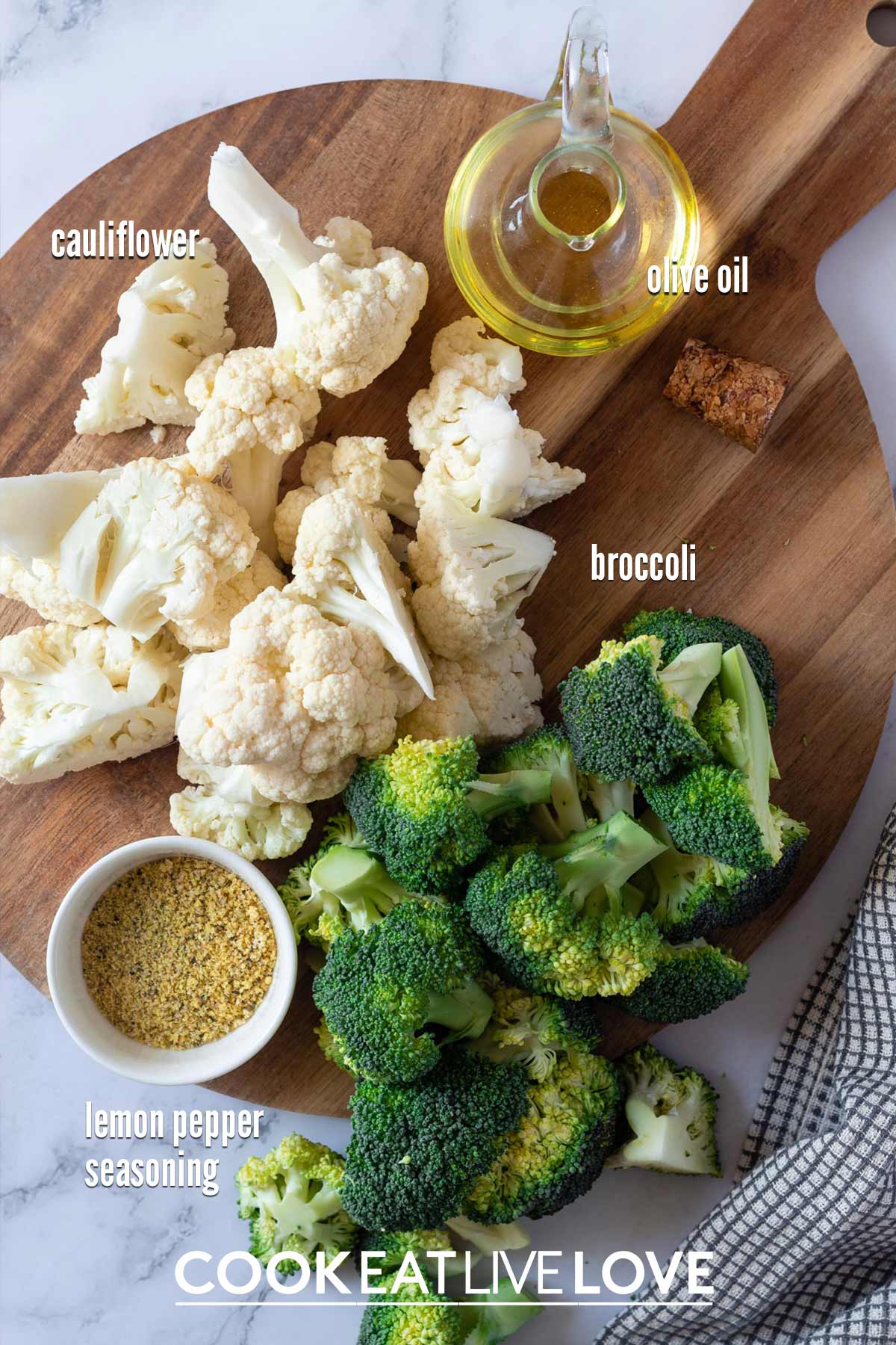Ingredients you need to make air fryer broccoli and cauliflower on the counter.