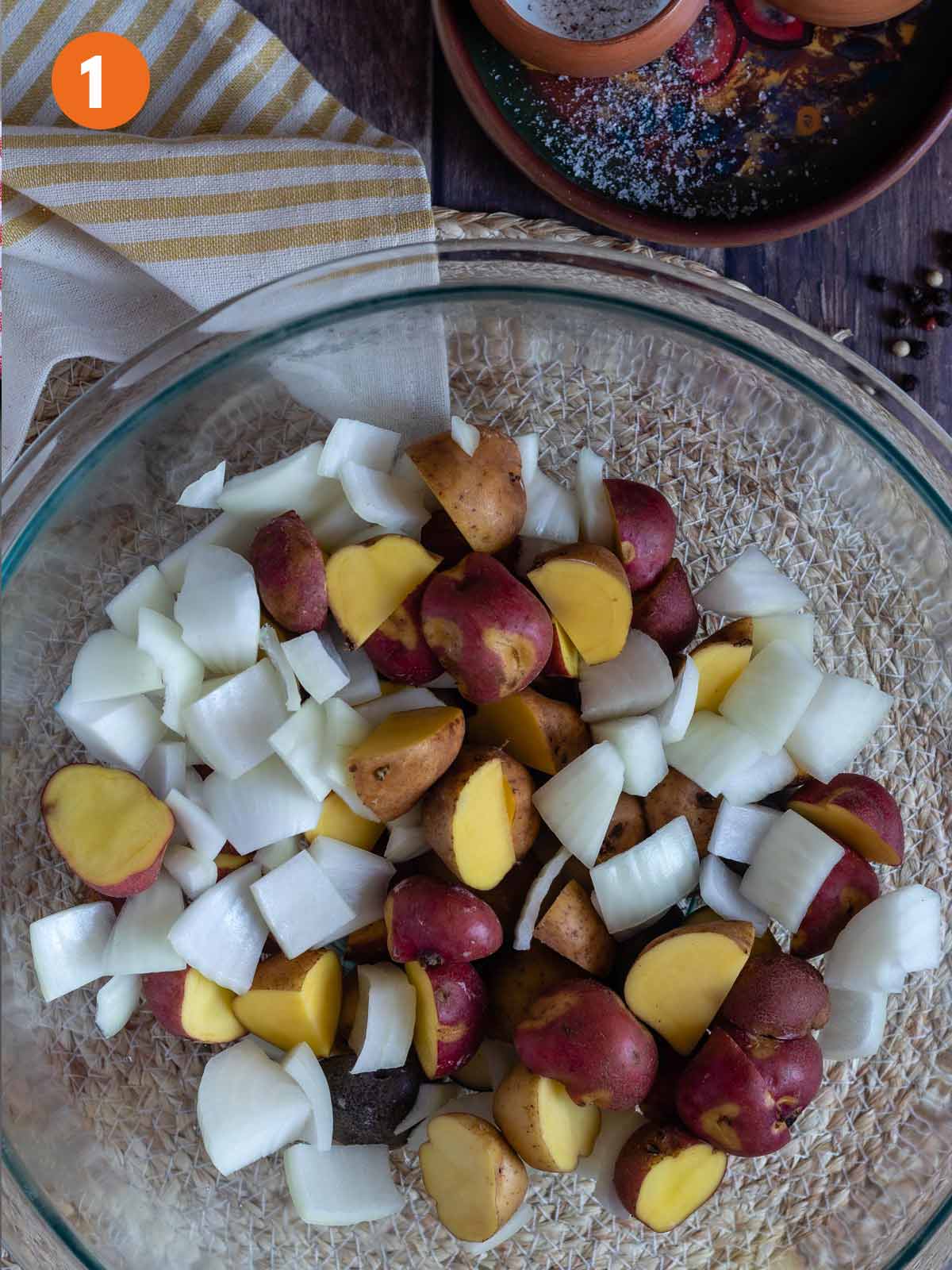 Potatoes and onions in a bowl.