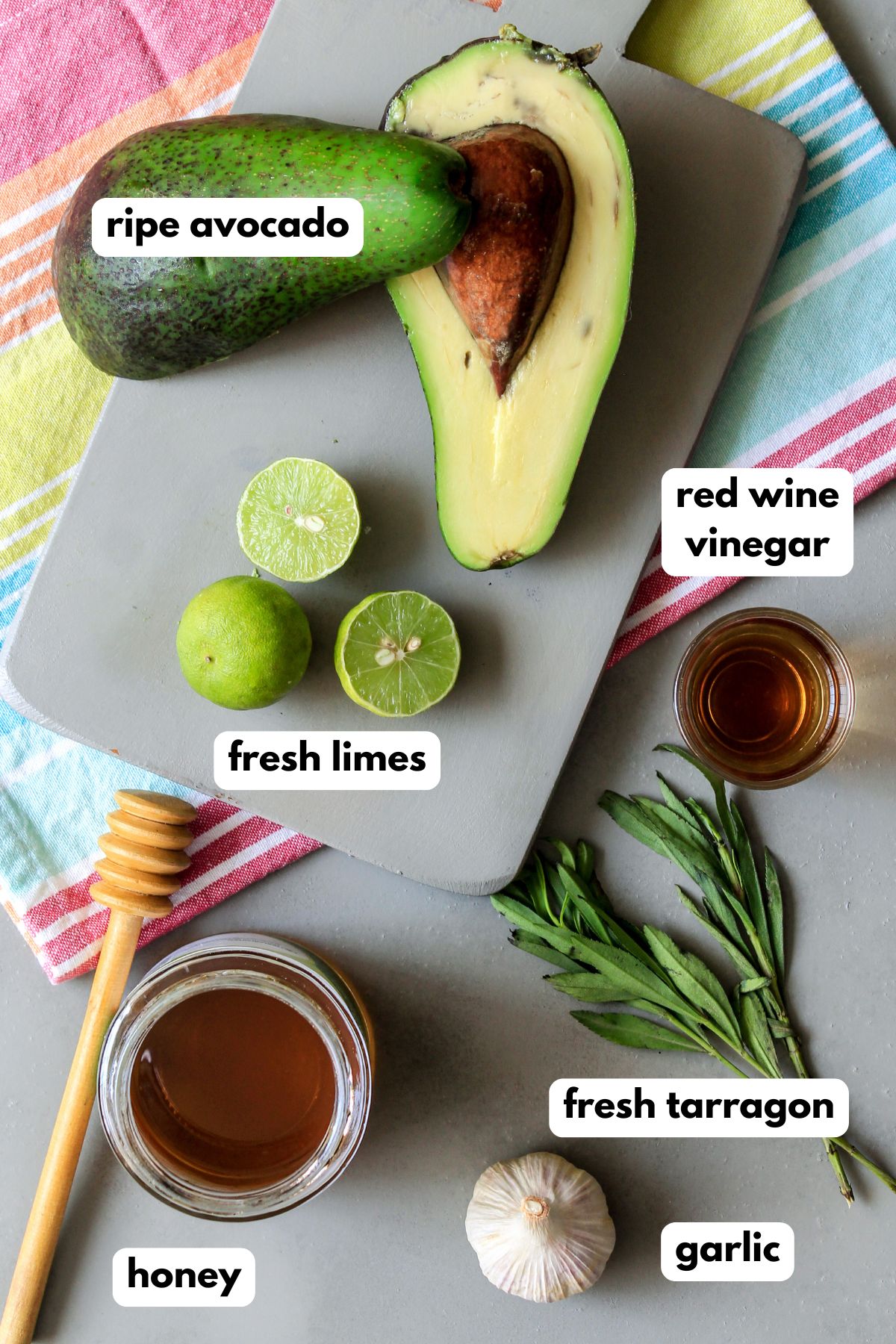 Ingredients to make salad dressing on the table with labels