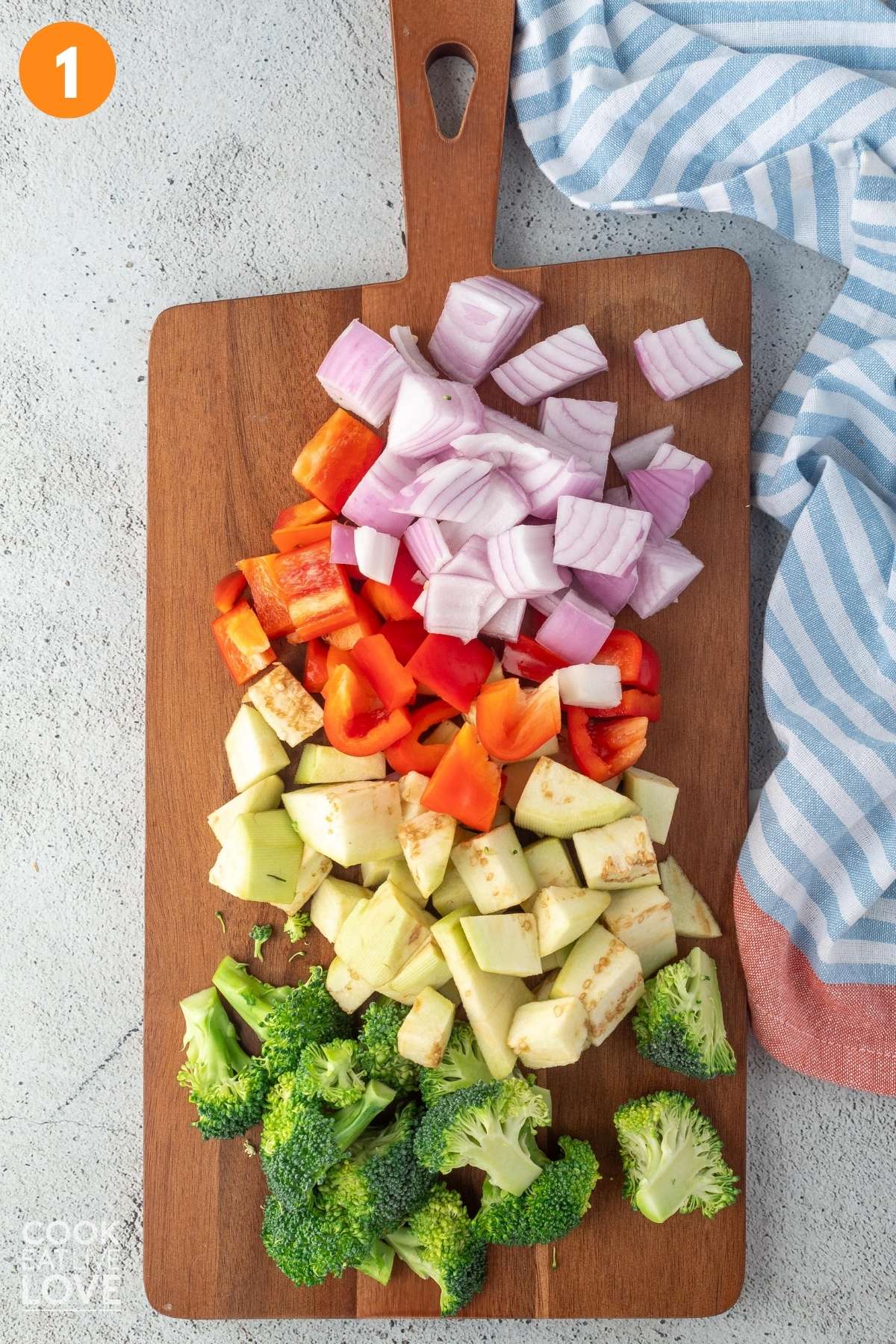Vegetables on a wooden cutting board.