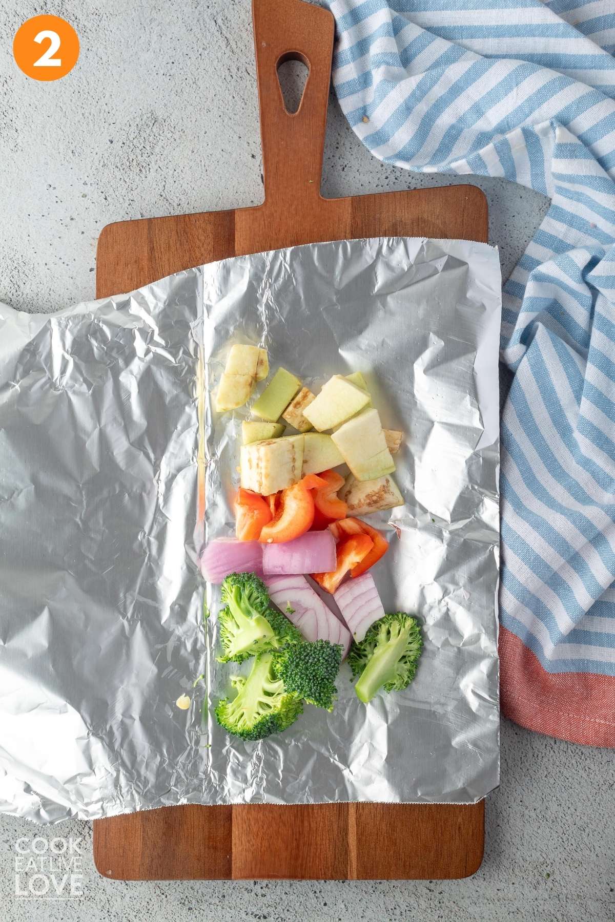 Vegetables on top of foil.