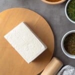 Pin for pinterest graphic with image of tofu and text on top.