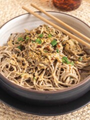 Noodles, sprouts and asparagus on a plate.