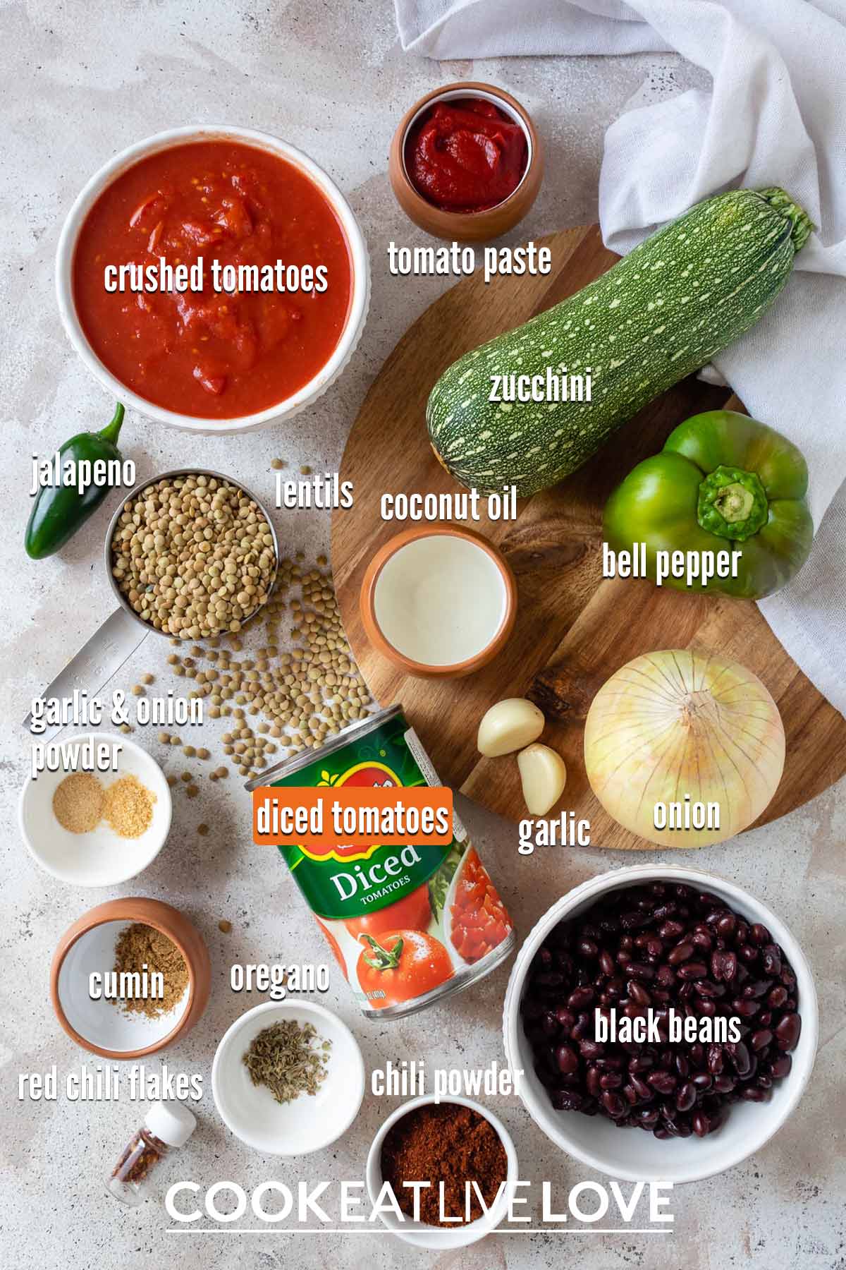 Ingredients to make slow cooker vegetarian chili on the table.