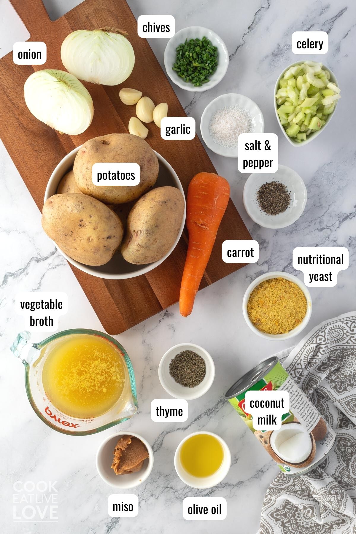 Ingredients to make creamy vegan potato soup with text labels.