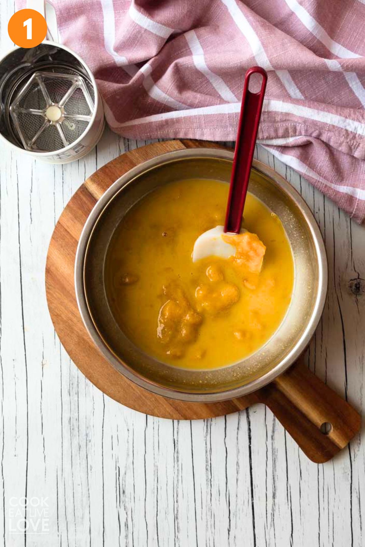 Wet ingredients to make vegan pumpkin muffins in a bowl