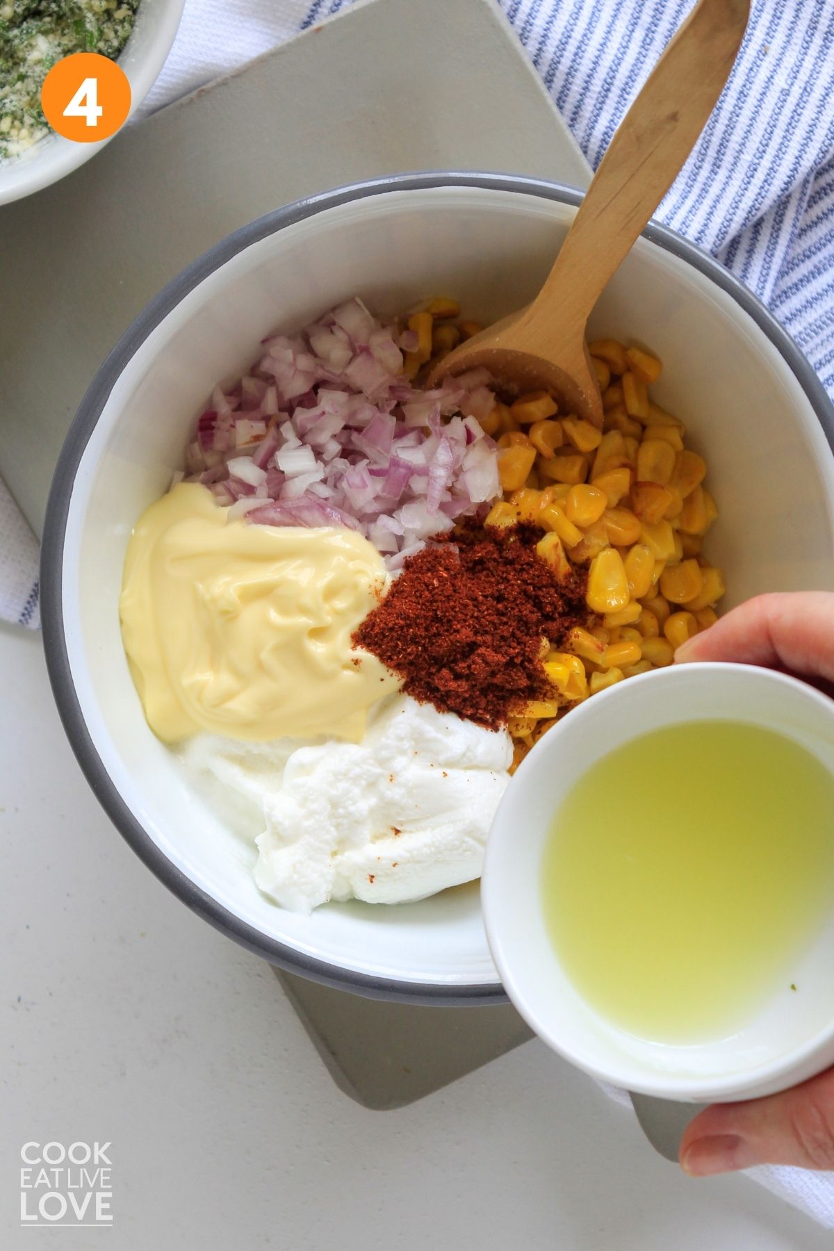 Ingredients for Mexican street corn in a bowl to mix.