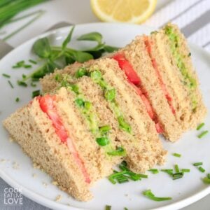 Vegan sandwich cut into triangle to show layers