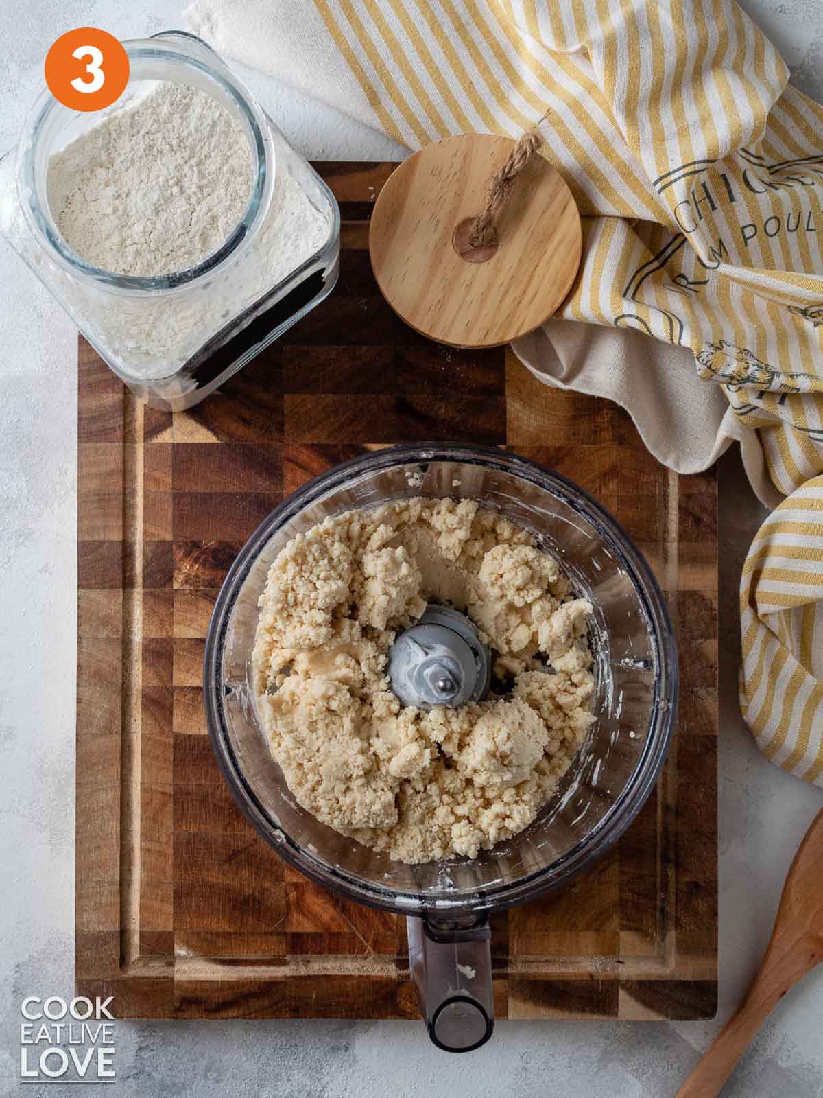 Cobbler dough mixed in a food processor bowl.