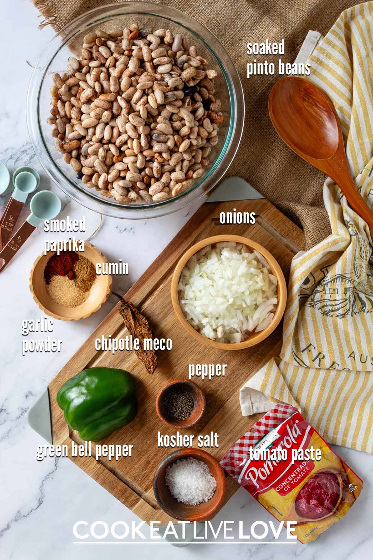 Ingredients to make slow cooker pinto beans on the table before cooking.