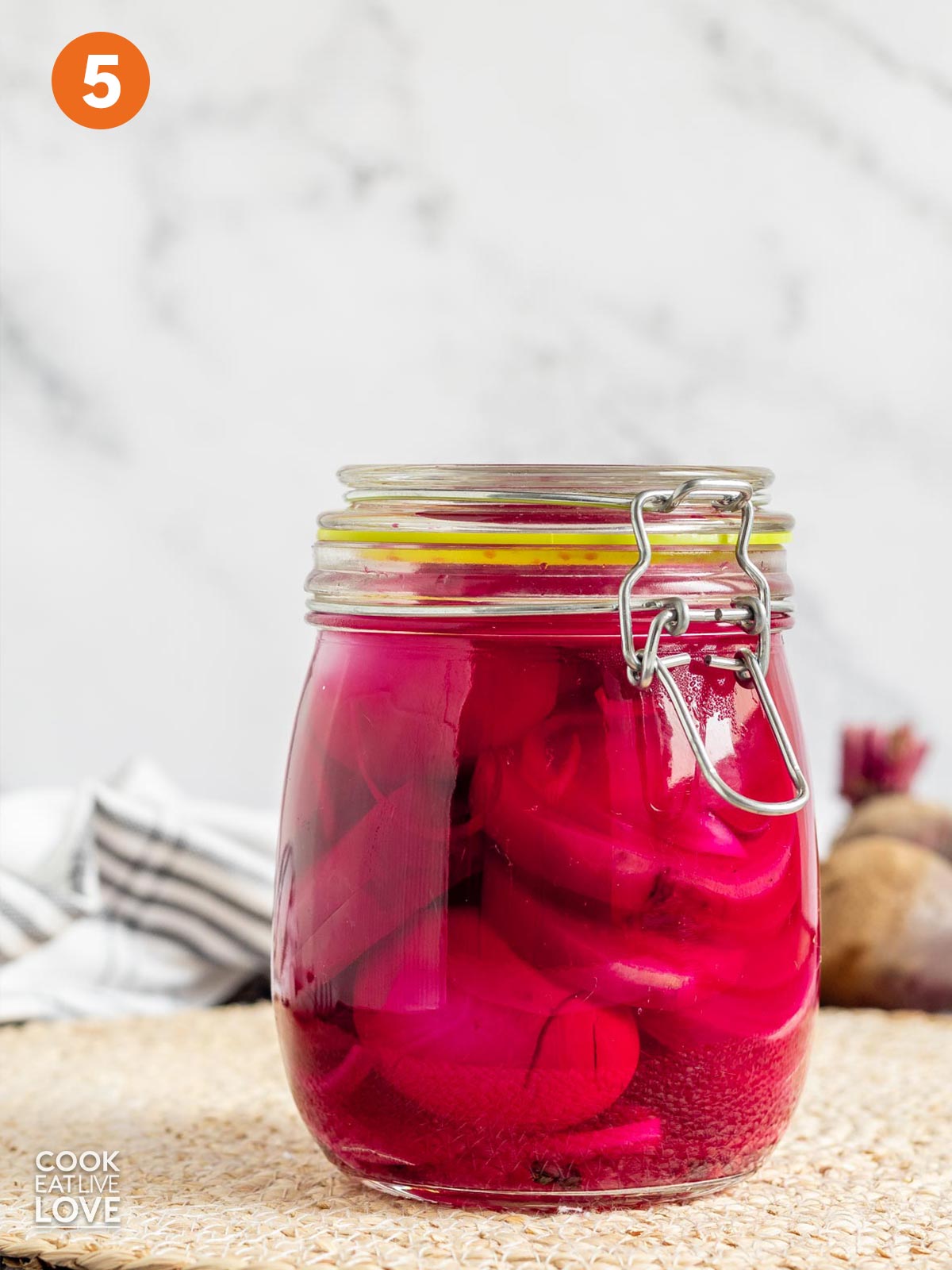A jar of pickled beets ready for the refrigerator.