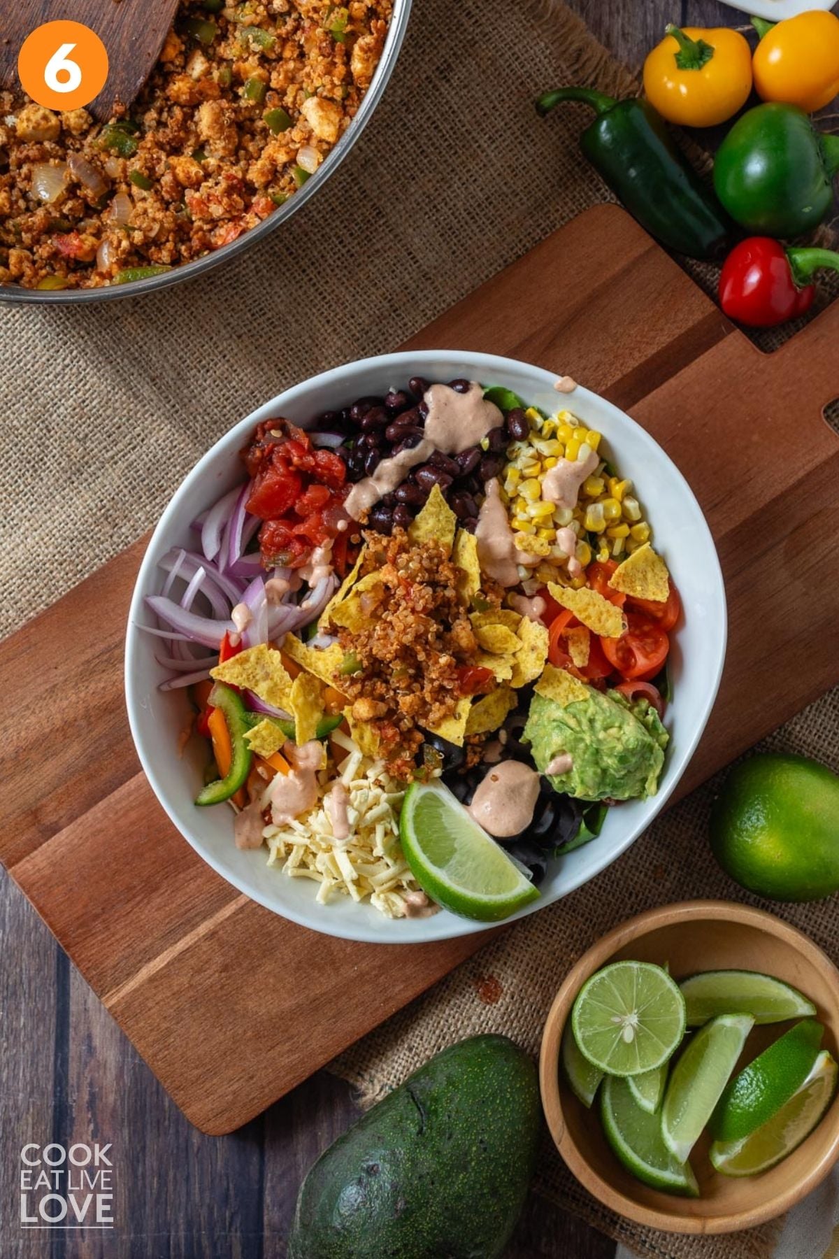 Vegan taco salad fully assembled in a white bowl. 