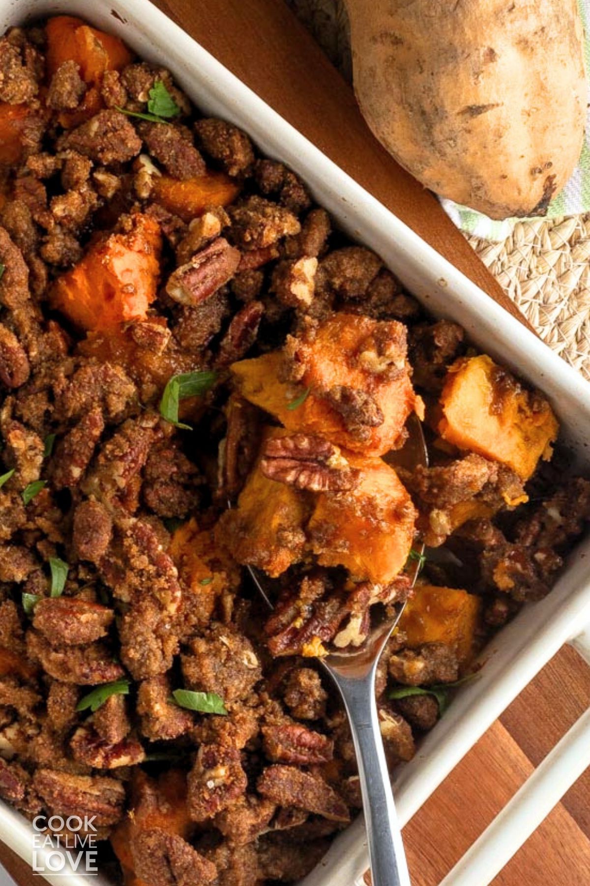 No egg sweet potato casserole after baking with a spoon resting in the dish. 