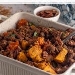 Pin for pinterest graphic with image of sweet potato casserole in a white dish with a spoon.