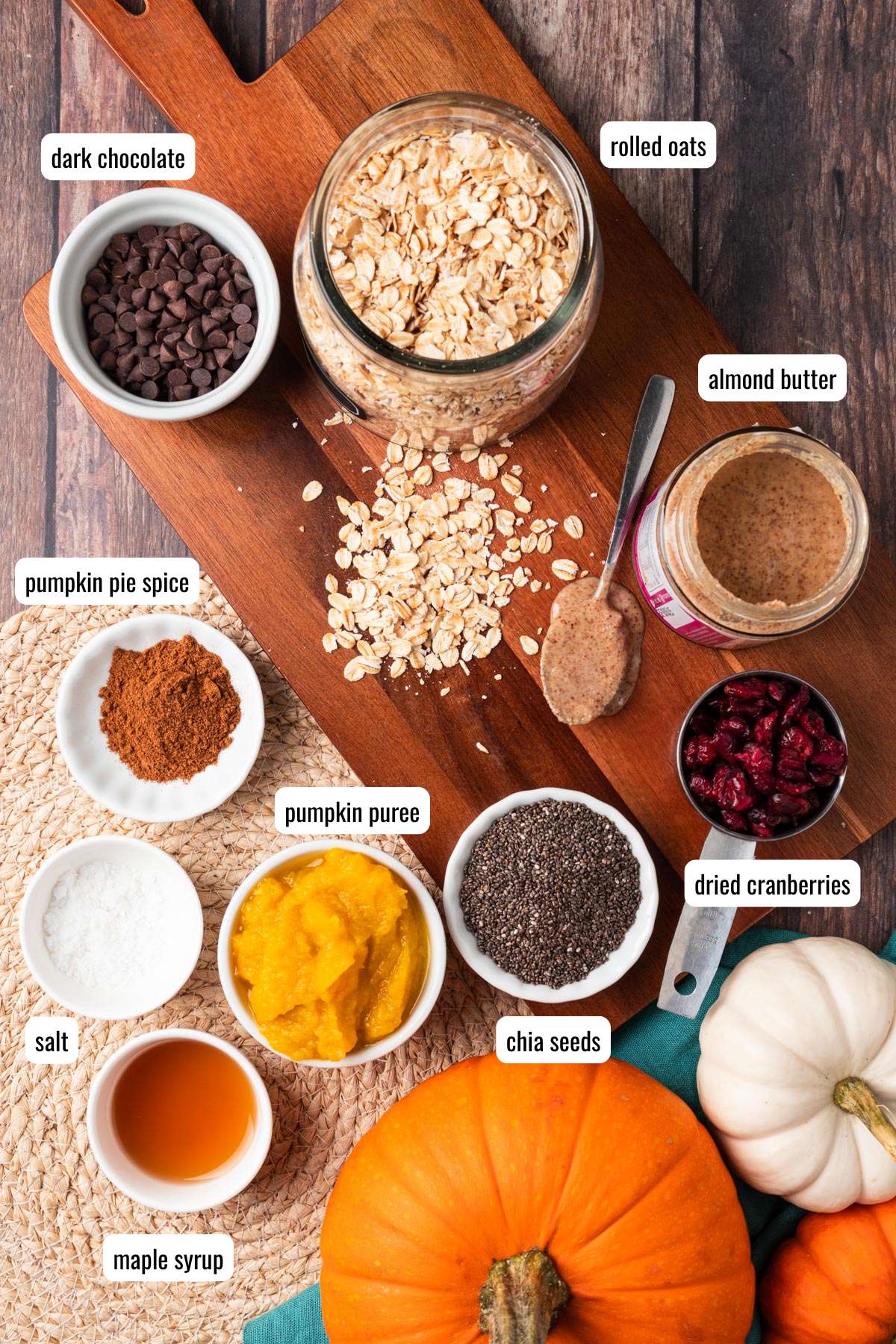 Ingredients to make pumpkin bites on the table with text labels before mixing together.