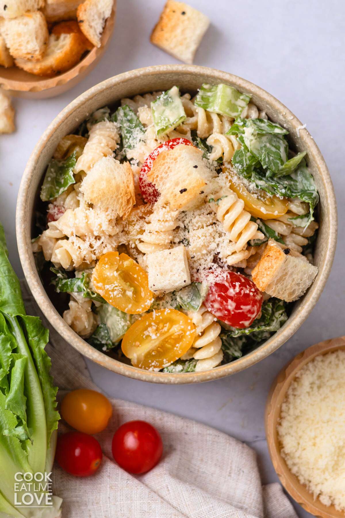 A bowl of Caesar pasta salad on the table.