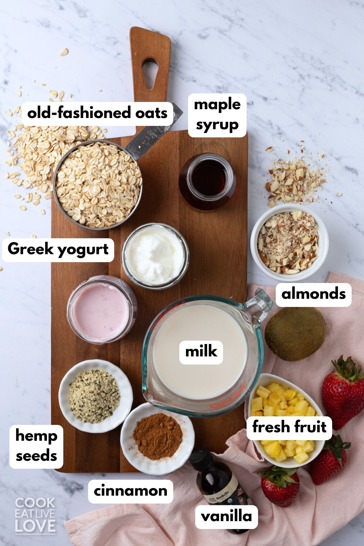 Ingredients to make overnight oats with Greek yogurt on the table.