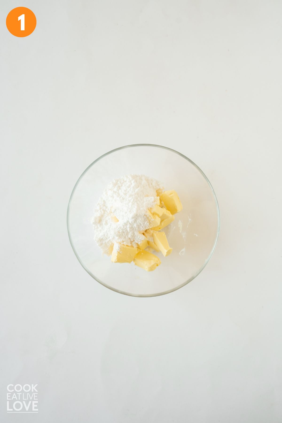 Butter and sugar to make the tartlet crust in a mixing bowl.