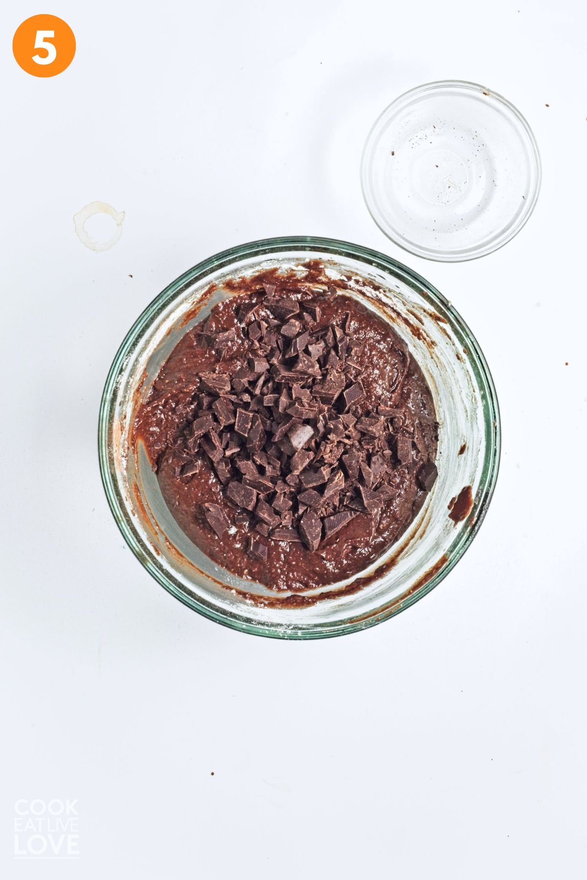 Chocolate chunks added to the brownie batter.