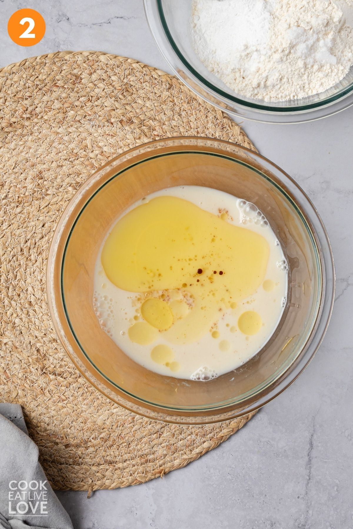 Wet ingredients in a bowl.