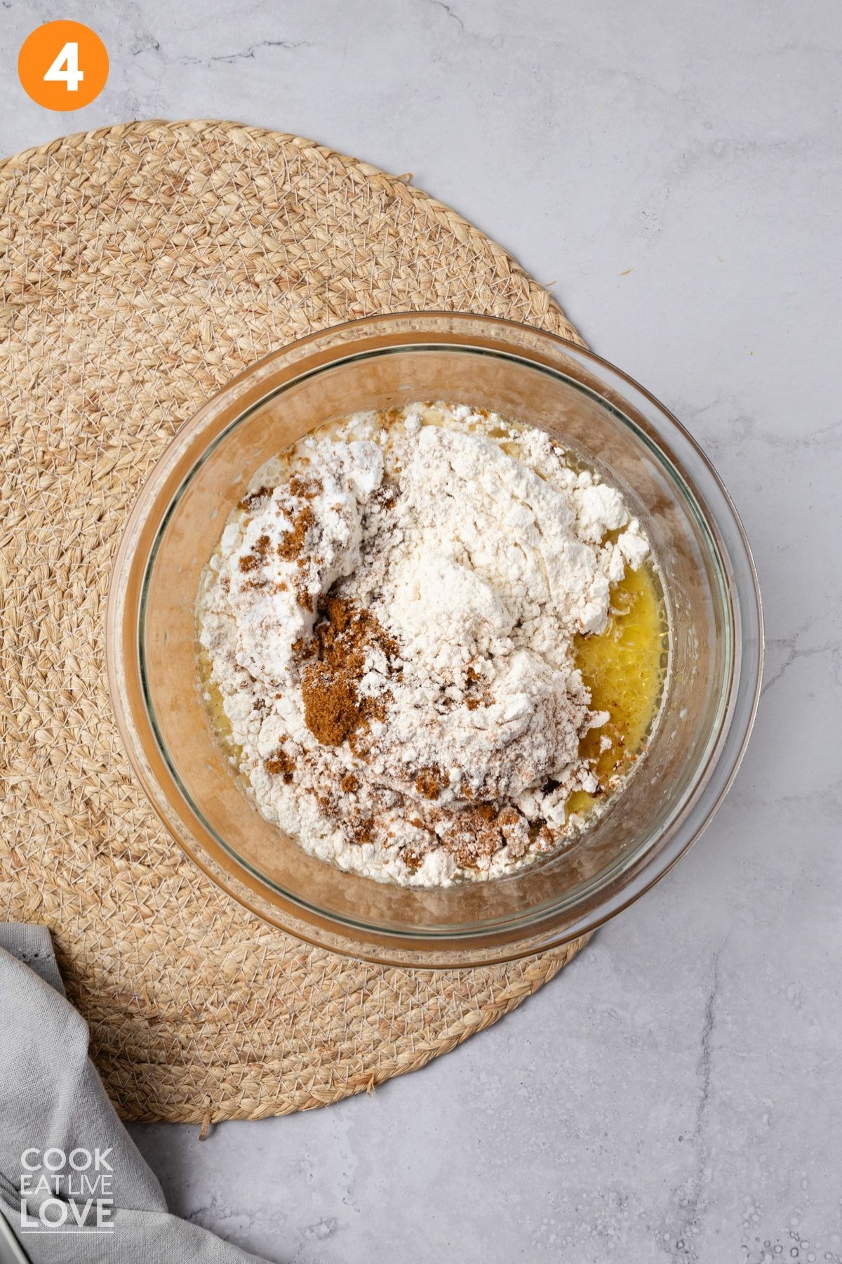 Dry ingredients added to the wet ingredients. 
