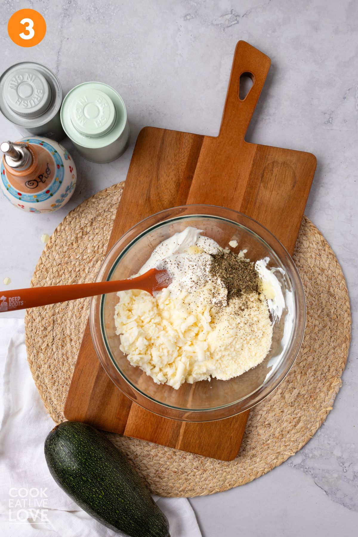 Cheese mixture for the inside of the zucchini rollatini in a bowl.