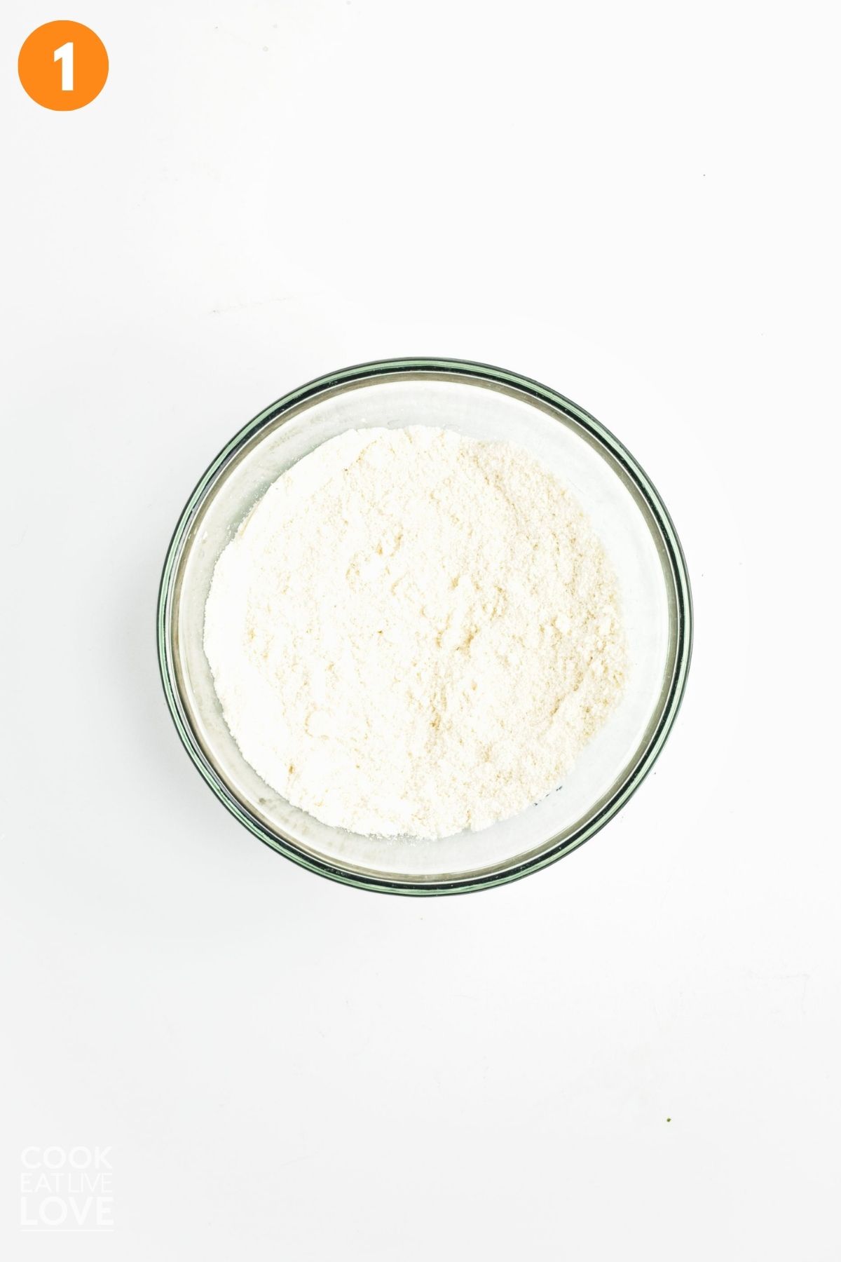 Dry ingredients to make shortbread crust in a bowl.