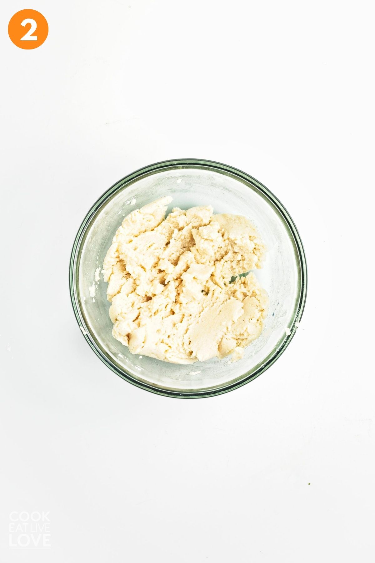 Shortbread crust mixed in a bowl.