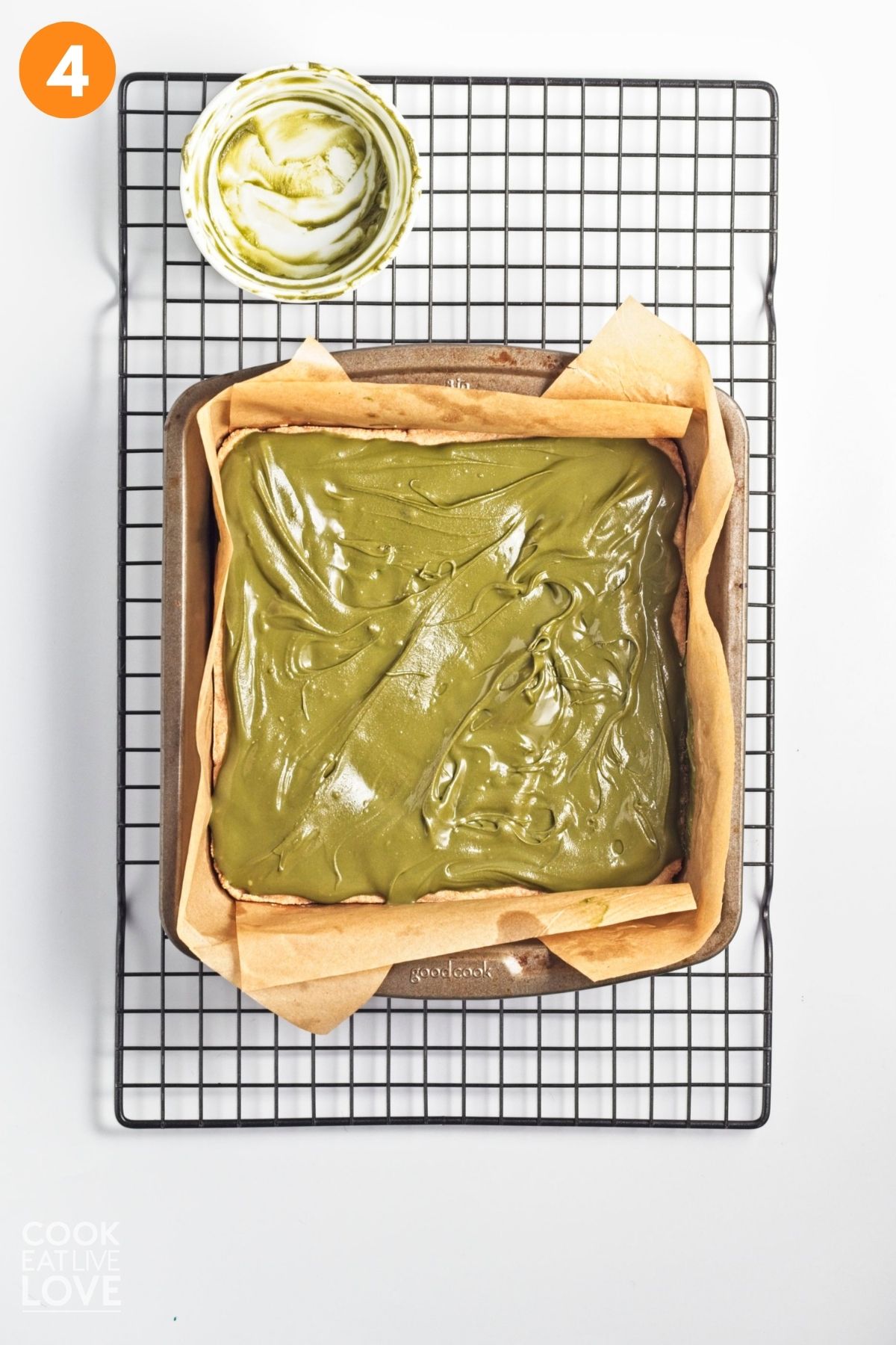 Pistachio cream spread over the top of the crust. 