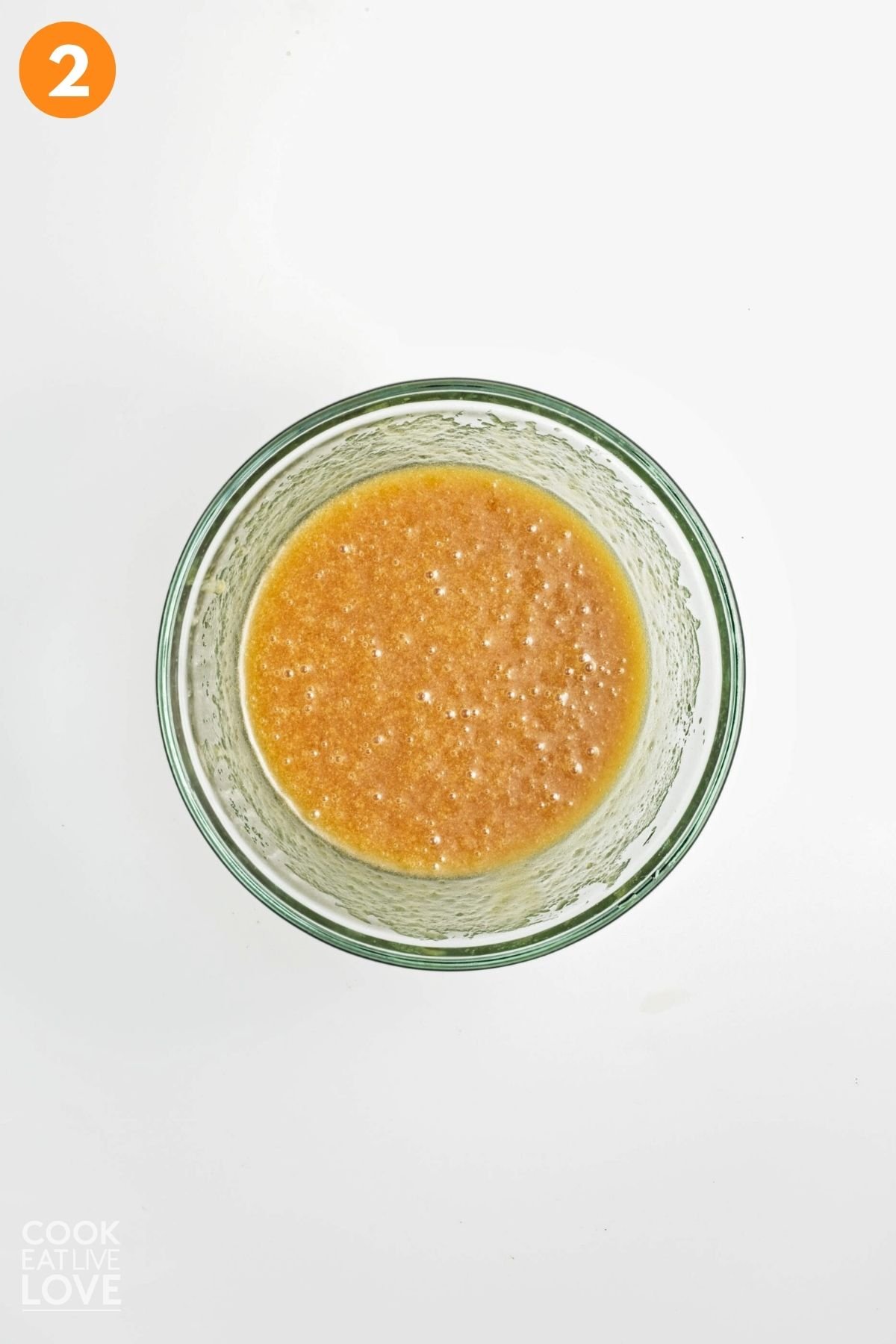 Wet ingredients mixed in a bowl.