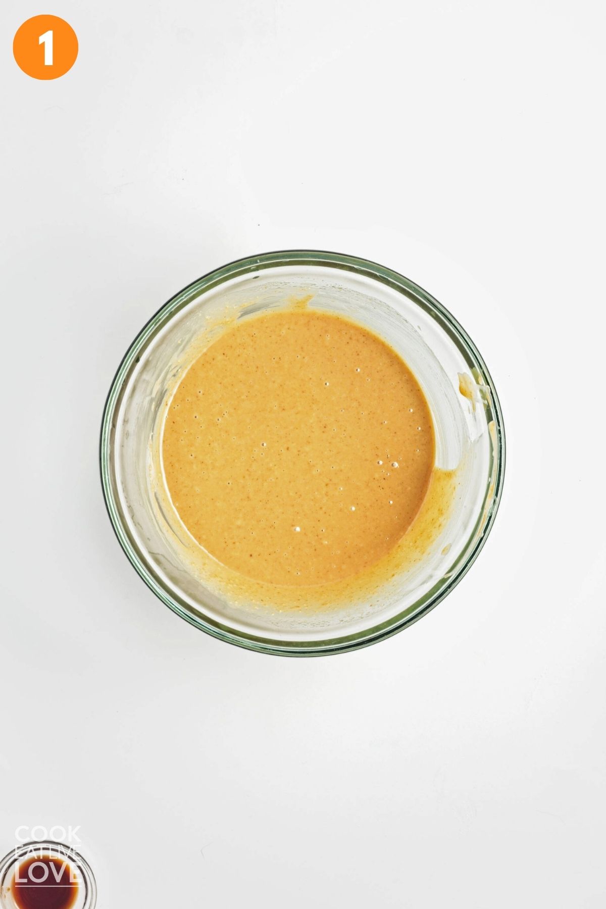 Peanut butter and oil mixed in a bowl.