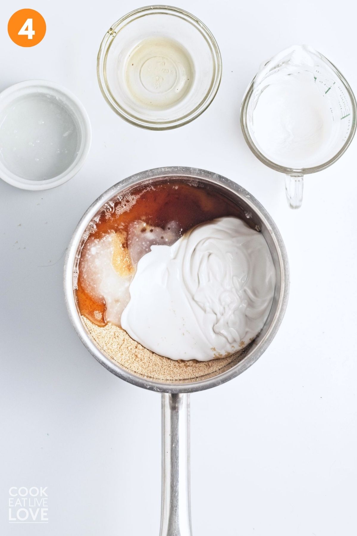 Adding the coconut cream to the pecan pie filling. 