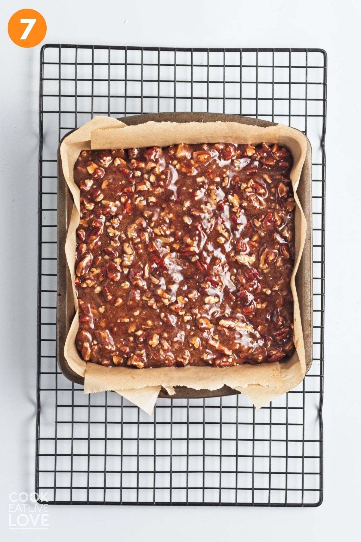 Caramel pecan mixture poured on top of the baked crust. 