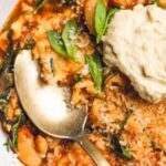 Pinterest graphic with image of vegan lasagna soup and text on top.