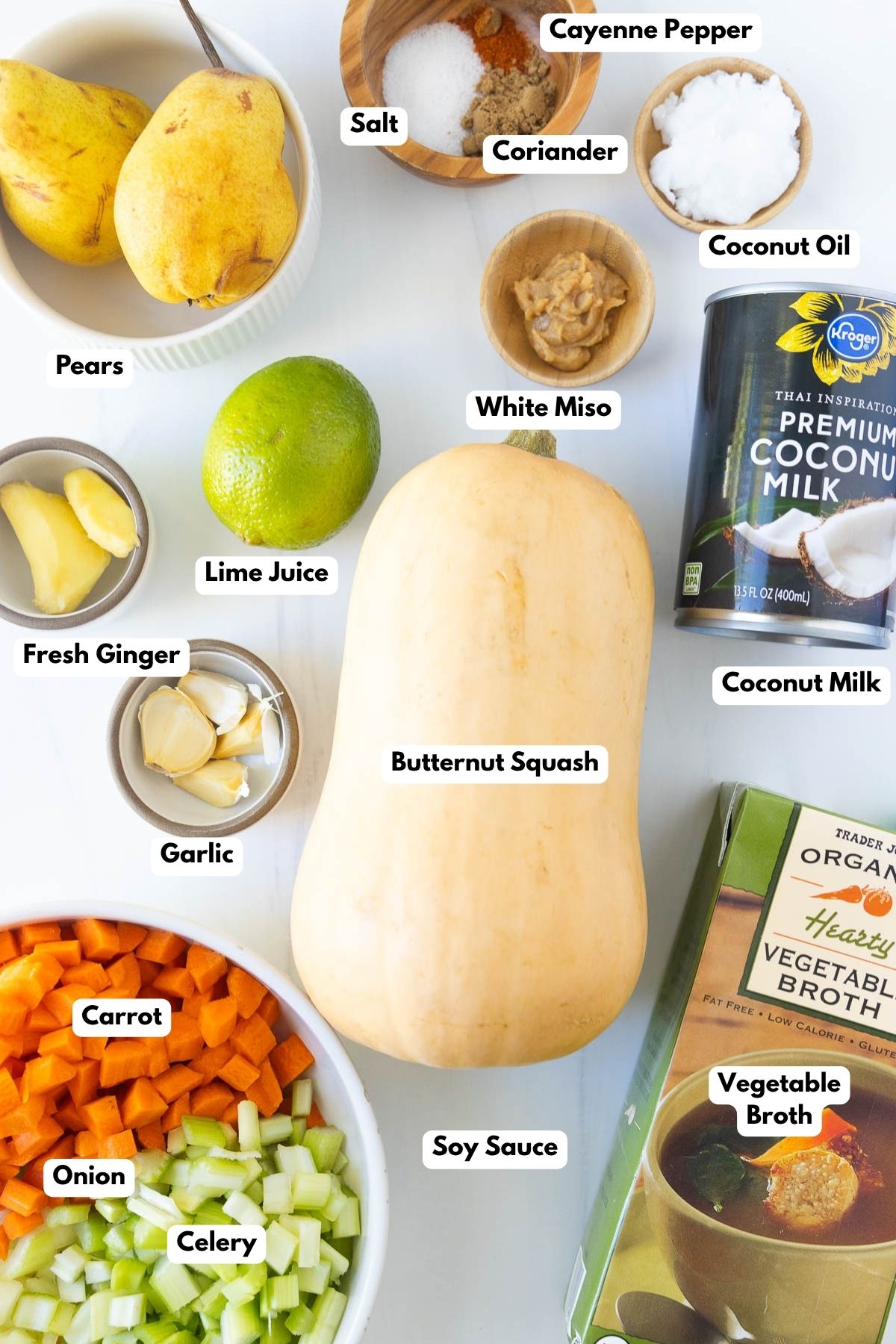 Ingredients to make butternut squash soup with coconut milk on the table.