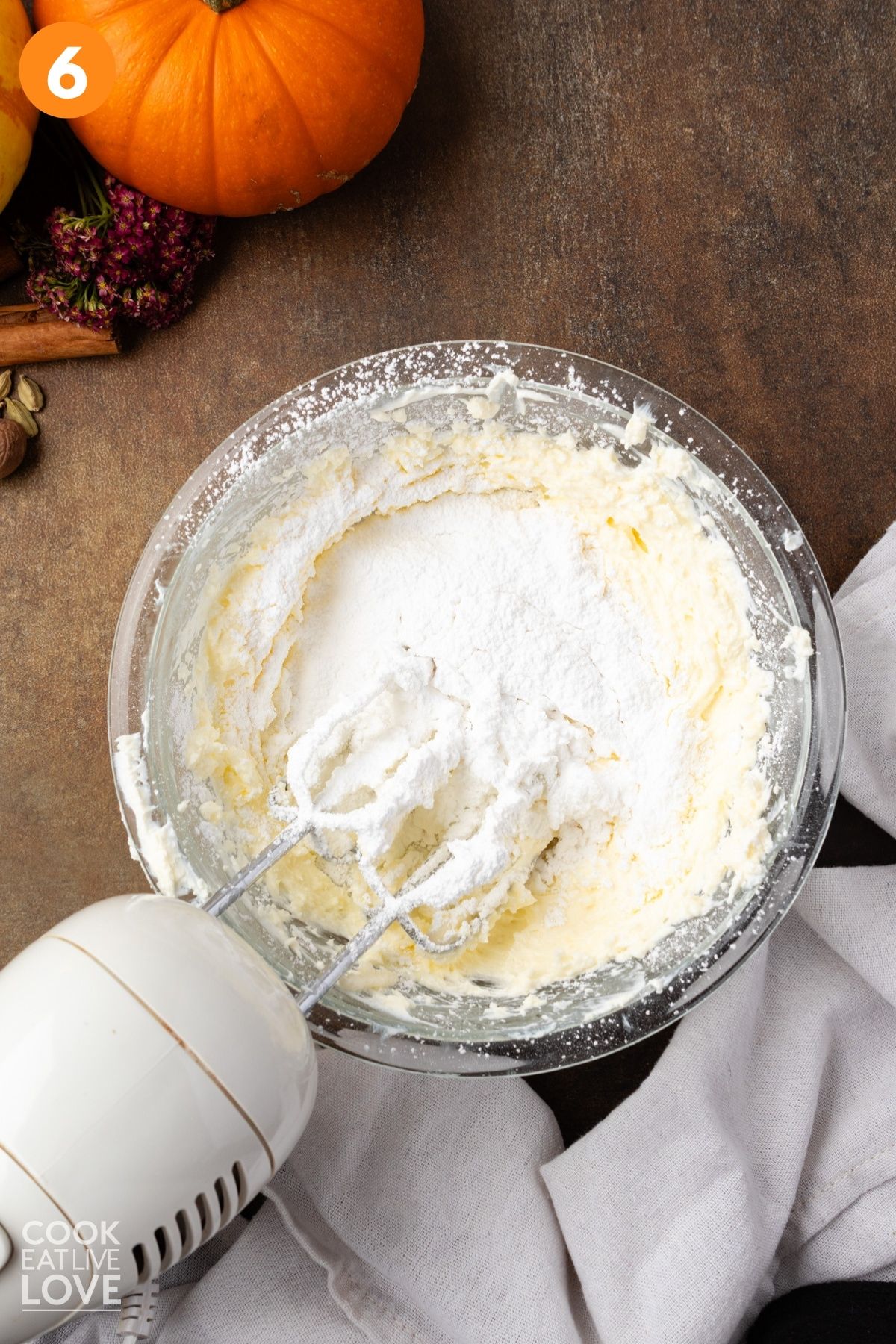 Powdered sugar added to the cream cheese and butter mixture. 