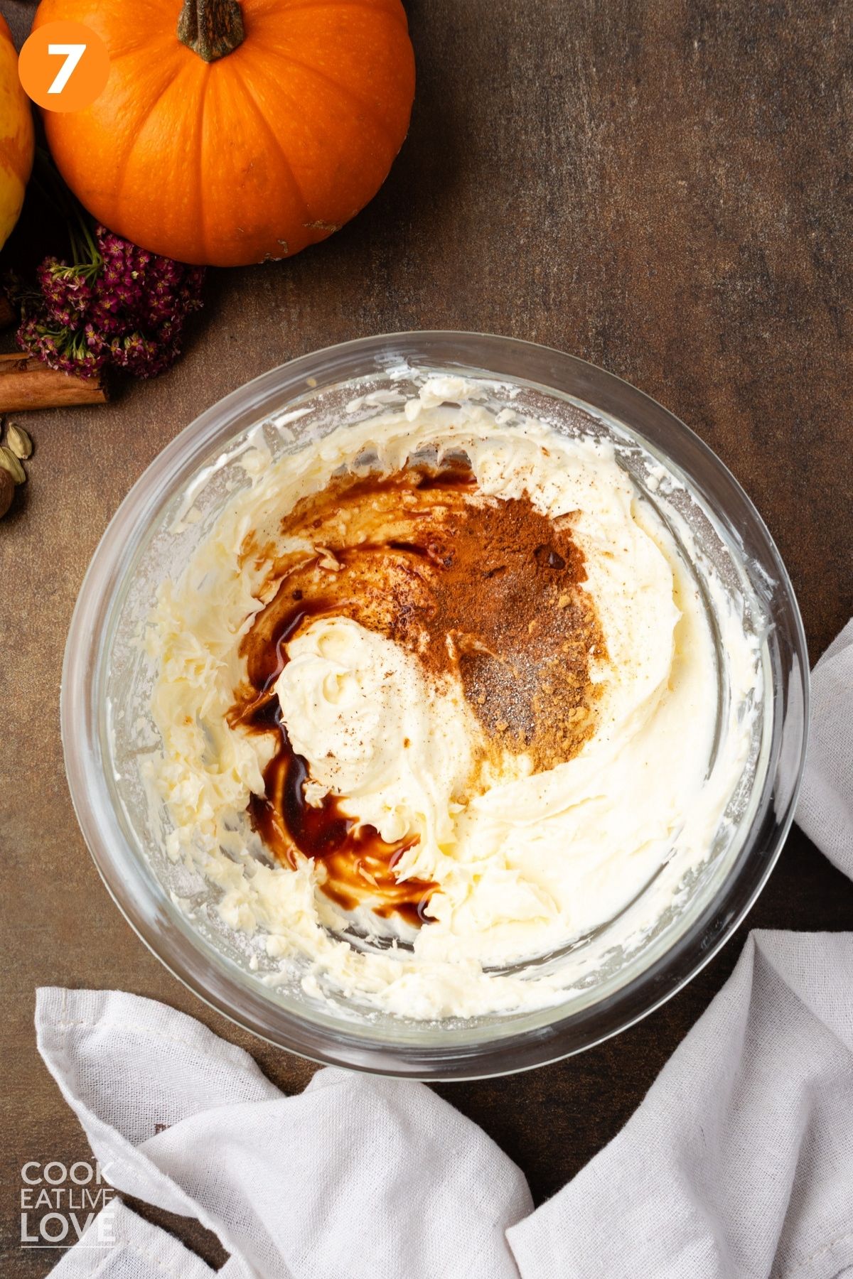 Spiced added to the bowl of cream cheese and butter. 