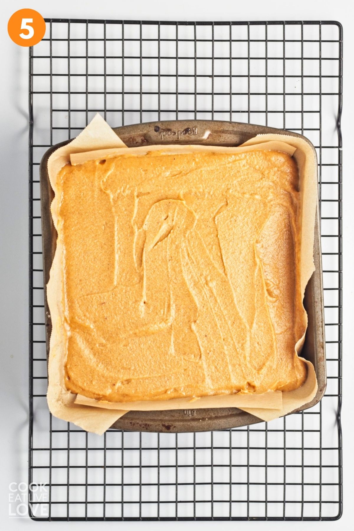 Sweet potato bar filling spread on top of the crust. 